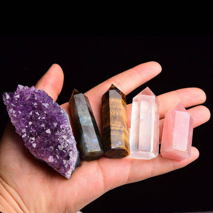 Showing size in hand of 5pc Natural Gemstone Giftset-hexagon-columns-Amethyst-quartz-labradorite-,Rose Quartz, Tigers Eye 350g in box w paper shredding -Tartarian Treasures & Trinkets