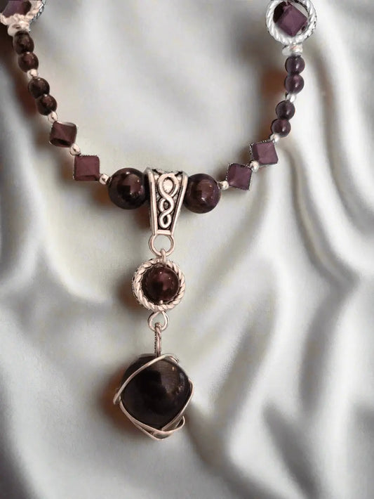 Red garnet Almandine-Pyrope necklace,  details, handmade, all red garnet beading, in a pattern of Rectangle, square and round garnet beads w hematite accent beads and a celtic Knot finding