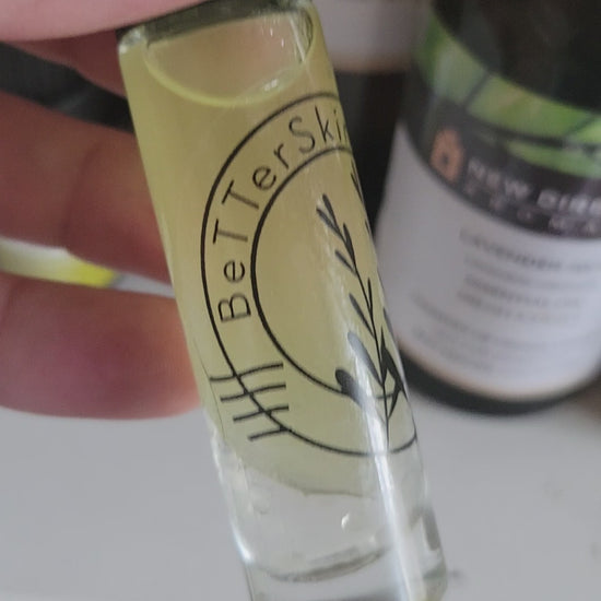 Video of 10 ml roll on bottle containing 
 BetterSkin Holistics  Wildcrafted  Botanical Raw Infused Skin Calming  Body Oil -Moringa Oil, Jojoba Oil, AloeVera Juice, Essential Oils Of Chamomile, Lavender, Bergamot 
Chemical Synthetic  & Detergent FREE  eczema , psoriasis,, dry, effective skincare